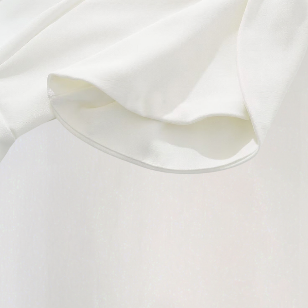 Dario | Elegant Minikjole – Puffermansjetter og feminin silhuett