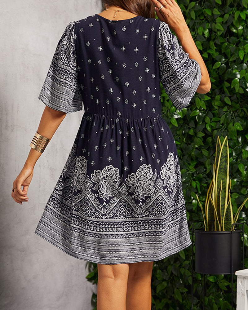 Ivana | Boho-klänning med V-ringning och tryck 