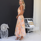 Katya | Lang Bohemsk Kjole – Halterneck og Elegant Blomstertrykk 